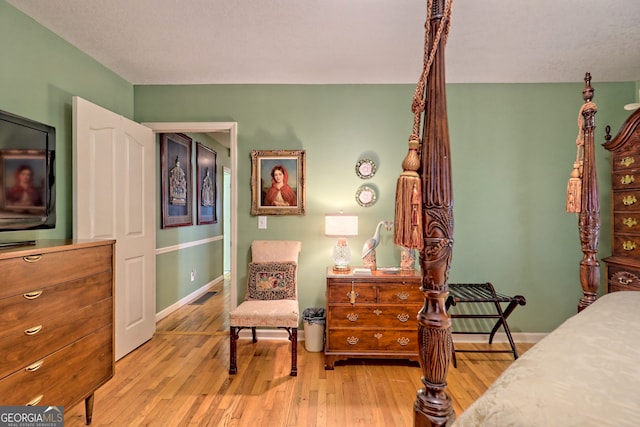 bedroom featuring light hardwood / wood-style flooring