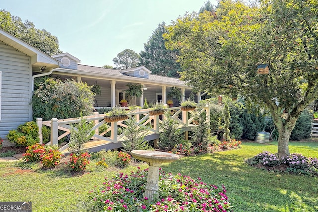 view of front of home with a front yard