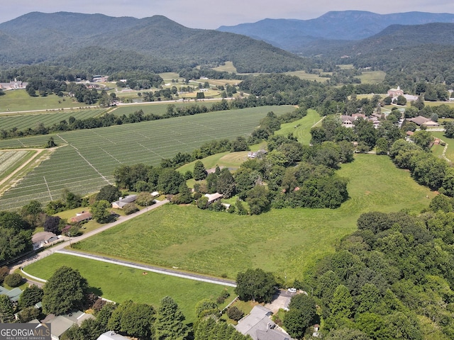 aerial view featuring a mountain view and a rural view