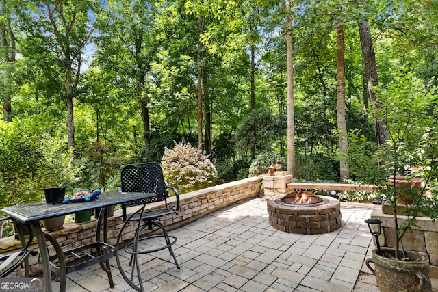 view of patio featuring a fire pit