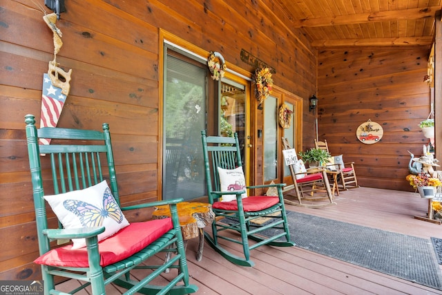 wooden deck featuring covered porch