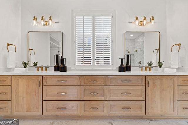 bathroom with vanity and an enclosed shower