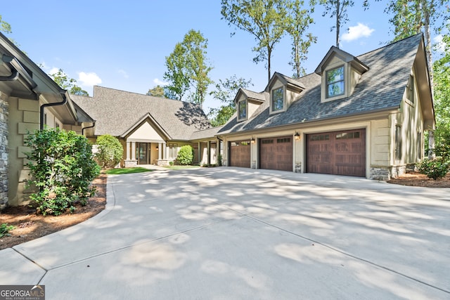 cape cod-style house with a garage