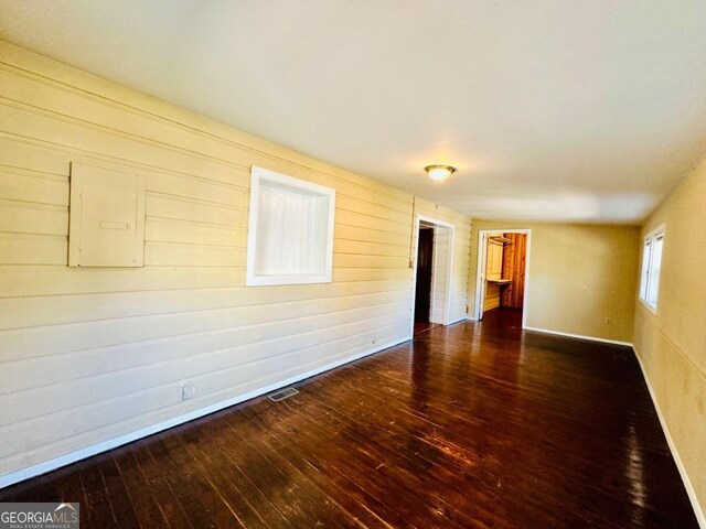 empty room featuring hardwood / wood-style floors