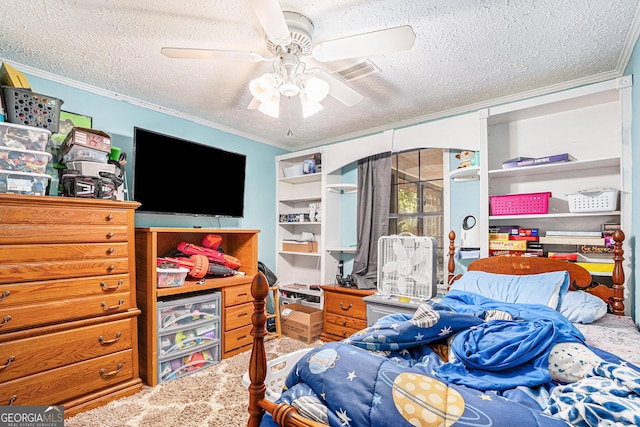 bedroom with crown molding, ceiling fan, and a textured ceiling