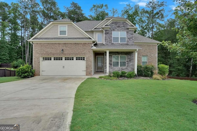 craftsman house featuring a garage and a front yard