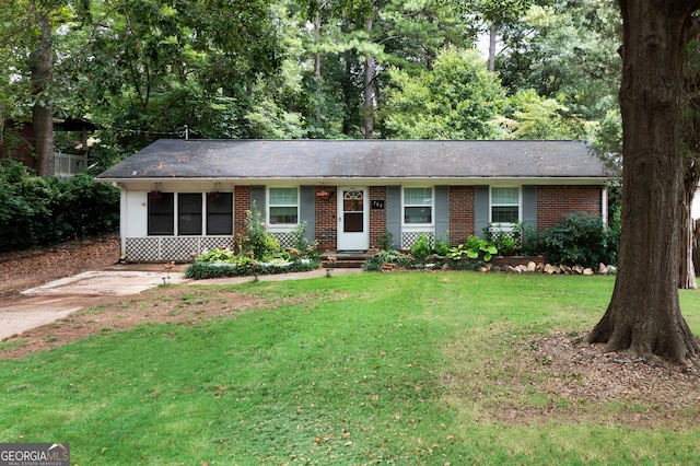 ranch-style house with a front yard