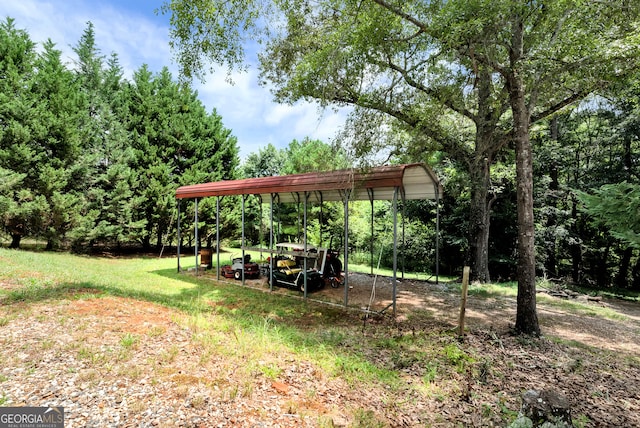 view of yard with a carport