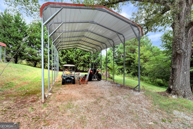 exterior space featuring a carport and a lawn