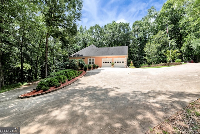 view of front of property with a garage