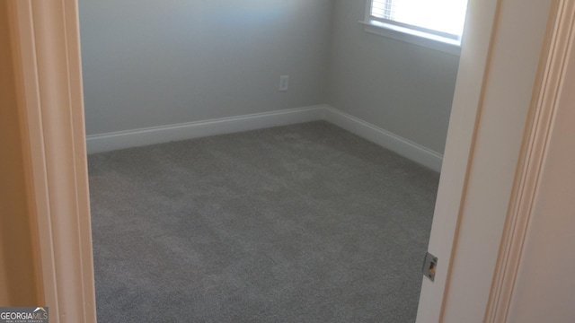 spare room with carpet flooring