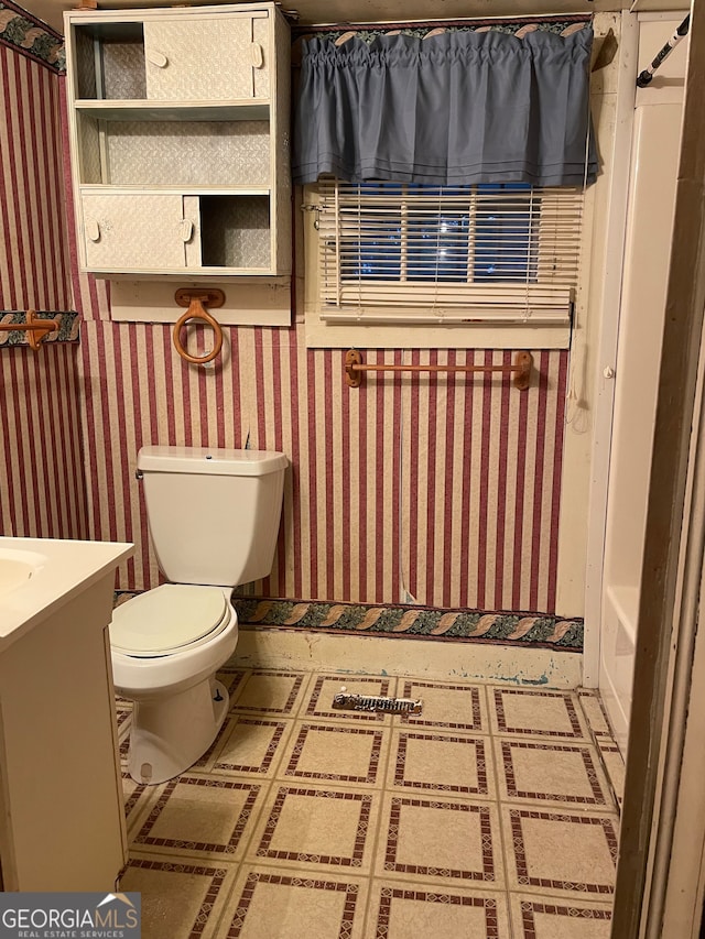 full bathroom featuring vanity, tile patterned flooring, toilet, and shower / bath combination with curtain