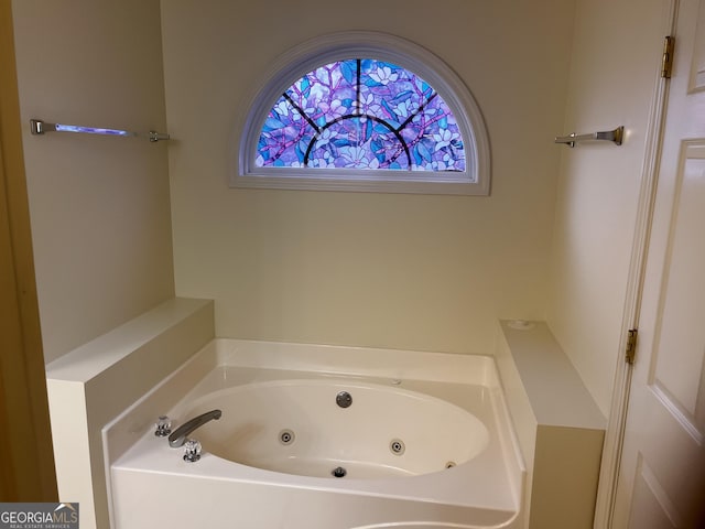 bathroom featuring a tub