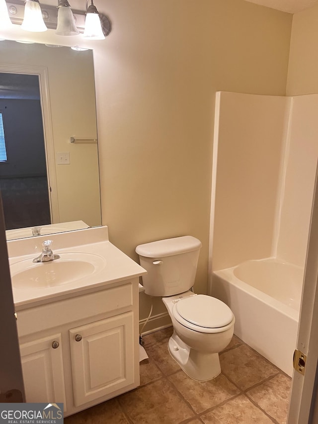 full bathroom with vanity, tile patterned floors, bathing tub / shower combination, and toilet