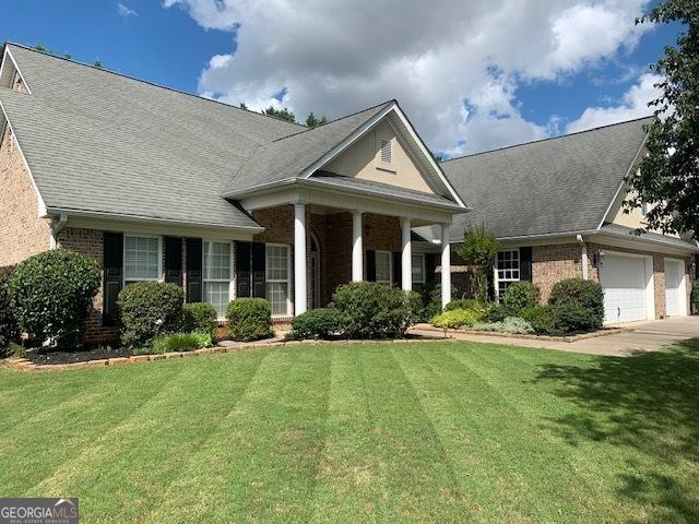 view of front of house with a front yard