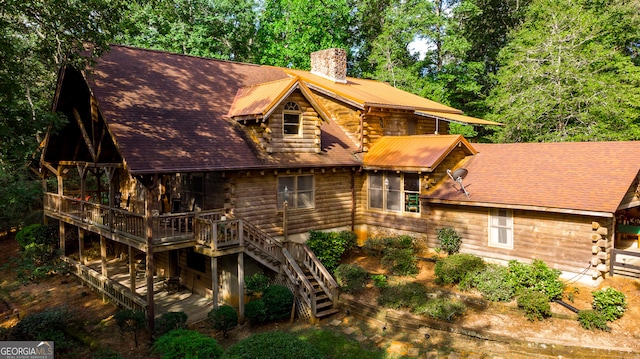 view of front of property featuring a deck