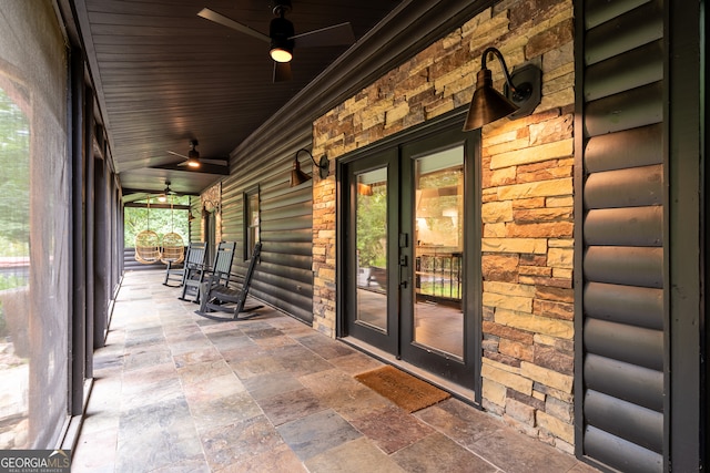 view of patio / terrace featuring a porch, french doors, and ceiling fan