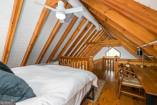 bedroom with lofted ceiling, wood-type flooring, and ceiling fan