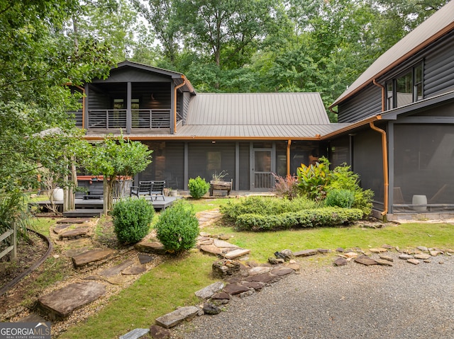 exterior space with a sunroom