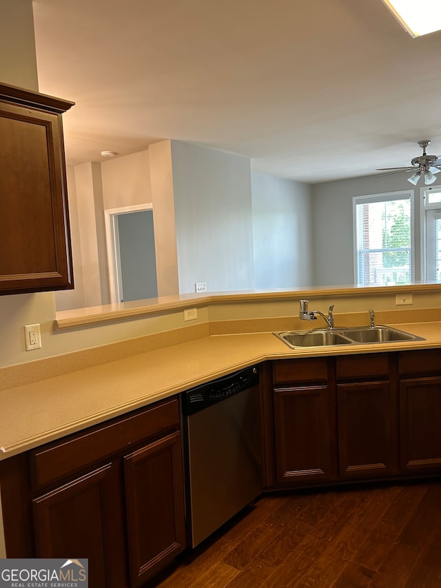 kitchen featuring sink, dark hardwood / wood-style flooring, stainless steel dishwasher, ceiling fan, and kitchen peninsula