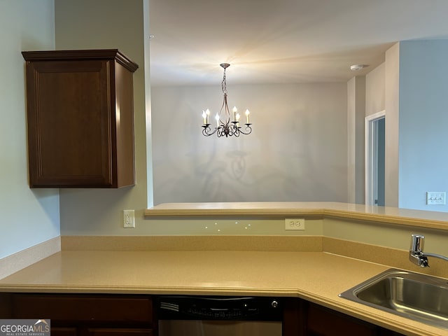 kitchen with dark brown cabinetry, hanging light fixtures, dishwashing machine, sink, and a notable chandelier