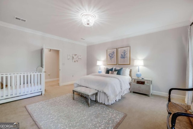 bedroom with ornamental molding and light colored carpet