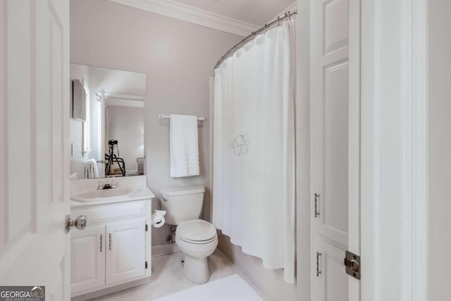 bathroom featuring toilet, tile patterned floors, vanity, ornamental molding, and a shower with curtain