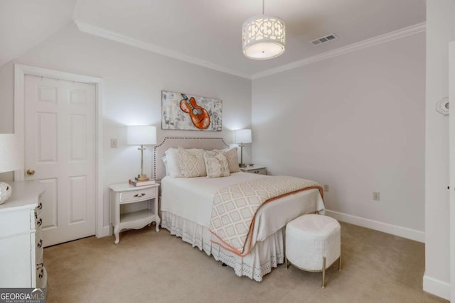 carpeted bedroom featuring crown molding