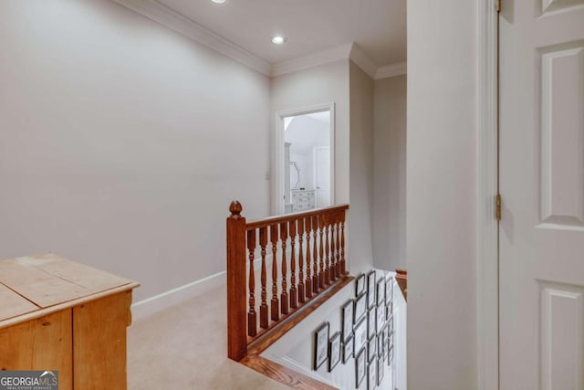 hallway with baseboards, carpet, crown molding, an upstairs landing, and recessed lighting