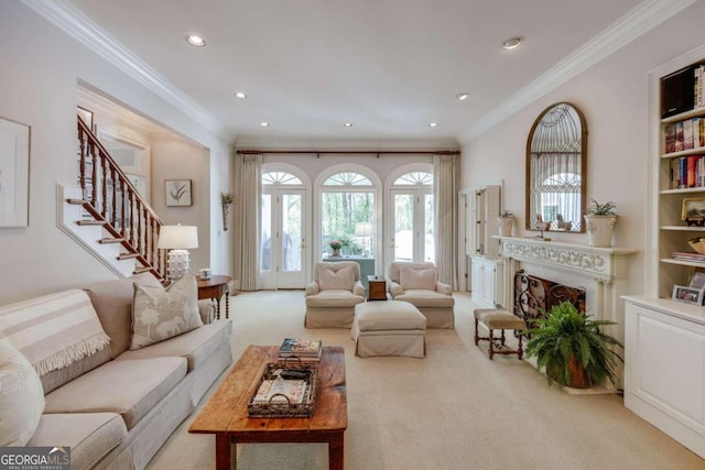 living area with light colored carpet, stairway, crown molding, a fireplace, and recessed lighting