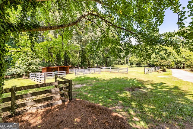 view of property's community featuring a lawn