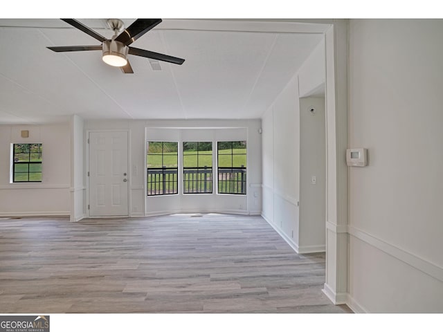 interior space with a healthy amount of sunlight, light hardwood / wood-style flooring, and ceiling fan