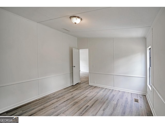 empty room featuring light hardwood / wood-style floors