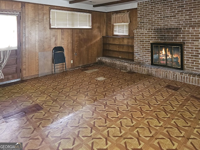 8347 Hilltop Rd, Jonesboro, GA 30236 - basement featuring a brick fireplace and wood walls