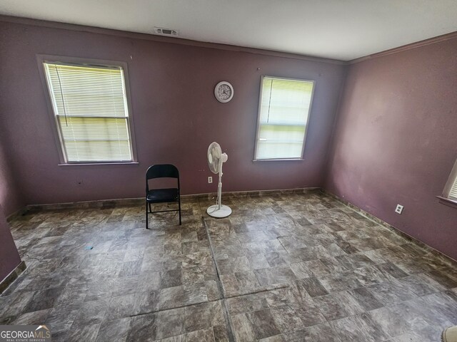 8347 Hilltop Rd, Jonesboro, GA 30236 - spare room with ornamental molding