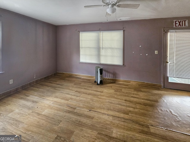 8347 Hilltop Rd, Jonesboro, GA 30236 - empty room featuring light hardwood / wood-style flooring and ceiling fan
