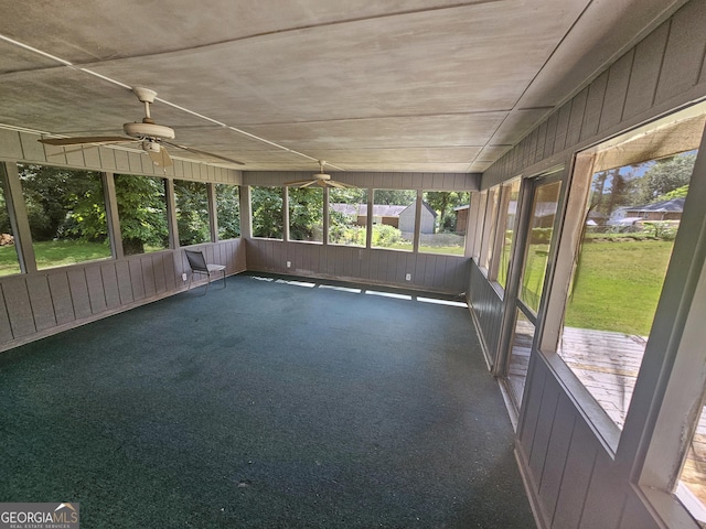 8347 Hilltop Rd, Jonesboro, GA 30236 - unfurnished sunroom featuring ceiling fan and a wealth of natural light
