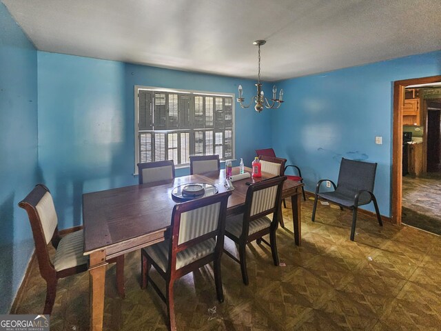 8347 Hilltop Rd, Jonesboro, GA 30236 - dining room with a notable chandelier
