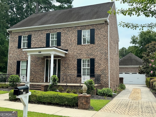 colonial inspired home with covered porch