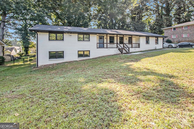 view of front facade with a front yard