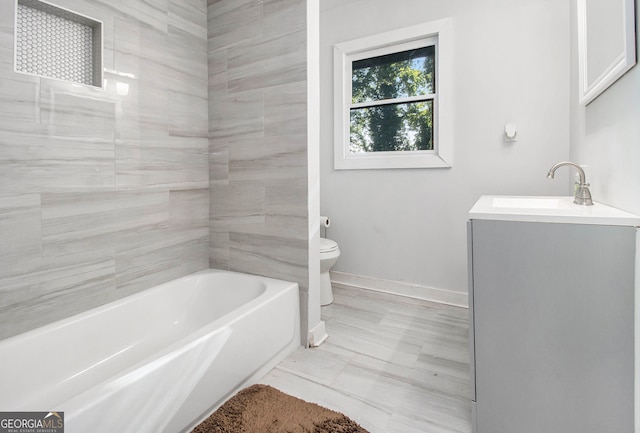 full bathroom with tile patterned floors, toilet, shower with separate bathtub, and vanity