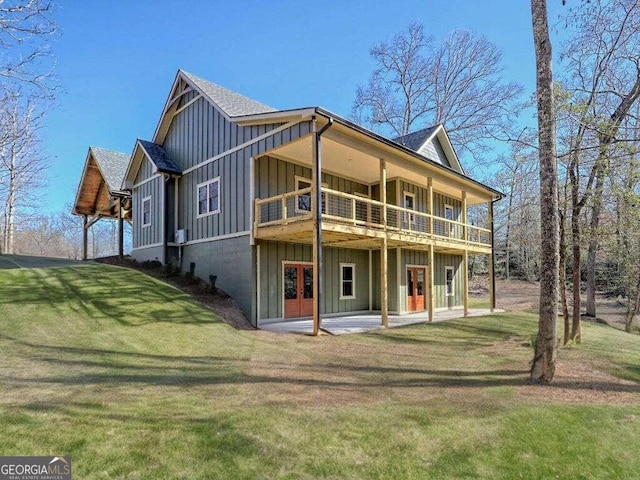 465 Wildflower Rdg, Warne, NC 28909 - view of front of home with a patio, a front lawn, and board and batten siding