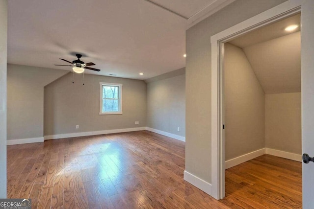 465 Wildflower Rdg, Warne, NC 28909 - bonus room with baseboards, vaulted ceiling, wood finished floors, and a ceiling fan