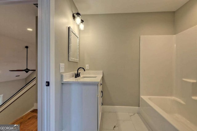 465 Wildflower Rdg, Warne, NC 28909 - bathroom with marble finish floor, vanity, and baseboards