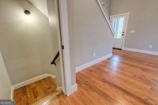 465 Wildflower Rdg, Warne, NC 28909 - stairs with baseboards and wood finished floors