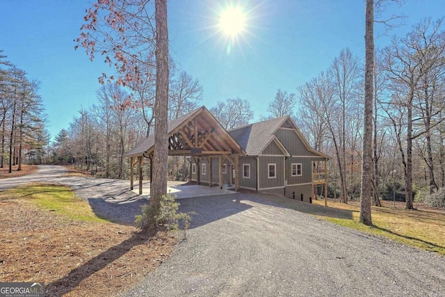 465 Wildflower Rdg, Warne, NC 28909 - rustic home featuring driveway and a shingled roof