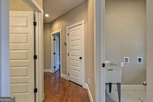 hallway featuring wood-type flooring