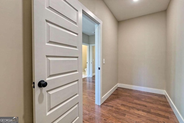 doorway with dark hardwood / wood-style floors