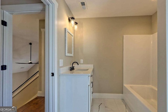 bathroom featuring vanity,  shower combination, and tile patterned floors