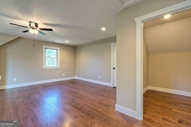 interior space featuring wood-type flooring, ceiling fan, and lofted ceiling